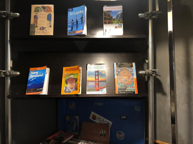 Plethora of self-help and travel guidebooks make for a cosy atmosphere at the cafe