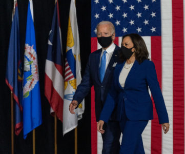 Kamala Harris as Vice-President, walking alongside the current President of the United States, Joe Biden