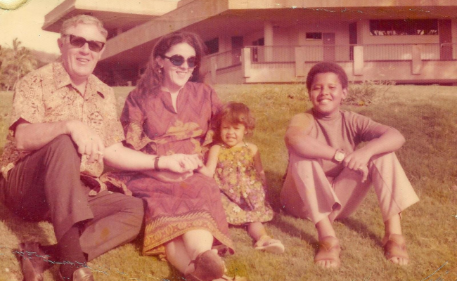 Young Barack Obama (left) with his sister, mother and grandfather in Hawaii